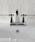 4 Inch Centerset Bathroom Faucet In Polished Chrome With Drip Free Ceramic Cartridge Crystal Lever Handle 1.2 GPM At 60 PSI Brass Construction Modern Classic Look For Your Bath, mounted on white sink.