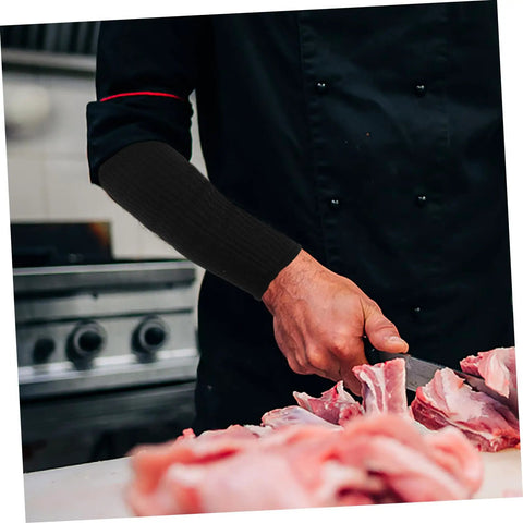 Solid Cut Resistant Arm Sleeves For Gritty Welding And Yard Jobs Lightweight Protective Guards That Flex Naturally and Lock Tight for Zero Hassle Safety On The Go, worn while cutting meat.