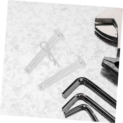 Silver scaffolding coupling pins and locking retainers with steel wrenches for fast scaffold assembly and door hinge security.