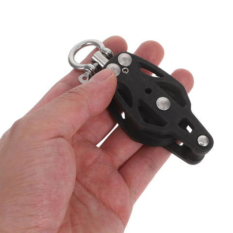 Hand holding Marine Grade Nylon Pulley Block for Sailing and Home Gym, Single Bearing Groove Wheel Cable Roller for Yacht Rigging