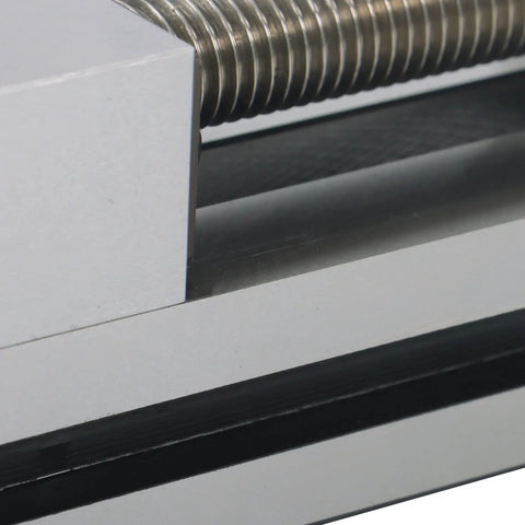 Close-up of Versatile QGG50 Surface Grinder Toolmaker Vise With Integrated V-Grooves for precision clamping.