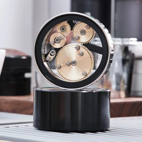 Next Level 58mm Coffee Distributor Needle With Solid Black Base Precision Gear Spin Drive close-up showing gear mechanism for espresso.