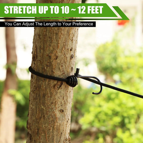 2 Pack Portable Camping Clothesline Set With 12 Colorful Clothespins And 13 Windproof Non Slip Clamps tied to tree trunk