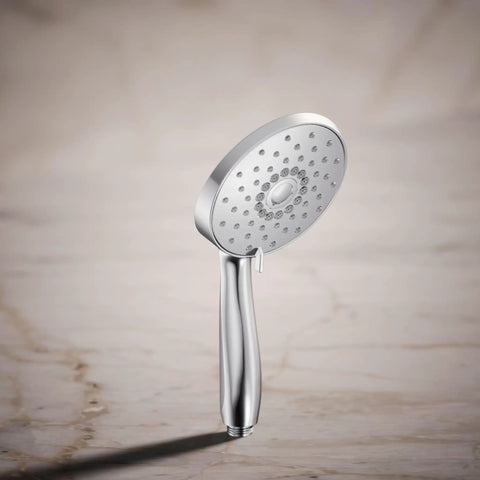 Forté Four-Function Handshower With Nonpositive Shutoff in polished chrome on marble surface