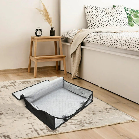 Lowkey Huge Underbed Storage Container And Clothes Organizer features grippy handles and smooth slide design on a rug.