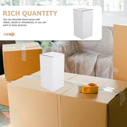 10 Pack Corrugated Cardboard Moving Boxes Mailers For Shipping And Packing 7x4x4 Inch stacked with tape in living room