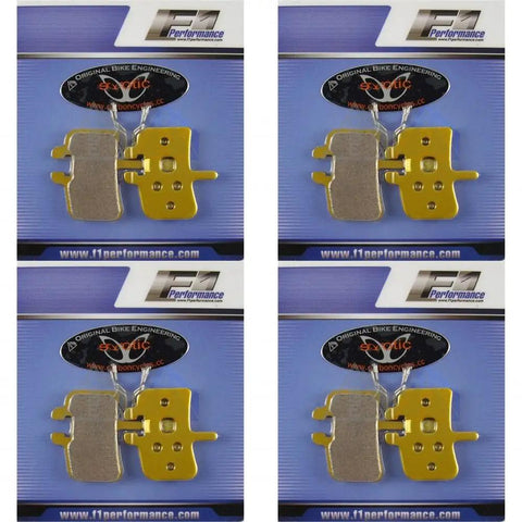 Top Tier Metallic Sintered Brake Pads For Mountain Bikes Hydraulic And Mechanical Disc Calipers 4 Pair Assembly Kit with return springs shown in packaging.