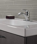Classic Single Hole Chrome Bathroom Faucet With One Handle, Fits 1 Hole Or 3 Hole Sinks, Includes Drain Assembly on white sink