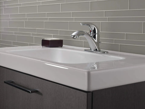 Classic Single Hole Chrome Bathroom Faucet With One Handle, Fits 1 Hole Or 3 Hole Sinks, Includes Drain Assembly on white sink