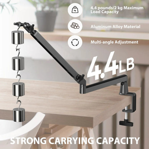 Badass Low Profile Microphone Boom Arm Stand For Gaming Streaming Podcasting With Smooth Swivel And Anti Vibration Cushion Mount on a desk with weights.