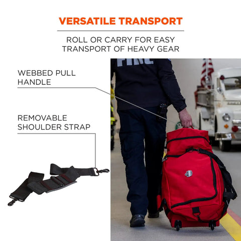 Firefighter using Arsenal 5005W Large Nylon Rolling Firefighter Rescue Turnout Gear Bag with webbed handle and shoulder strap