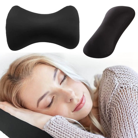 Woman resting on Comfy Microbead Roll Pillow 15 by 8 Inch Squishy Cushion for Neck and Back Support, black color.