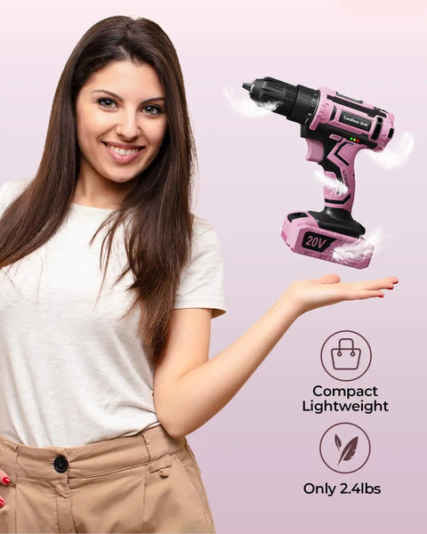 Pink Cordless Drill Set For Women 20V Lightweight Electric Power Drill With Three Eighths Inch Keyless Chuck Includes Power Pack And Charger Womens Tool Kit For Home Diy Projects And Quick Easy Household Fixes held by a woman.