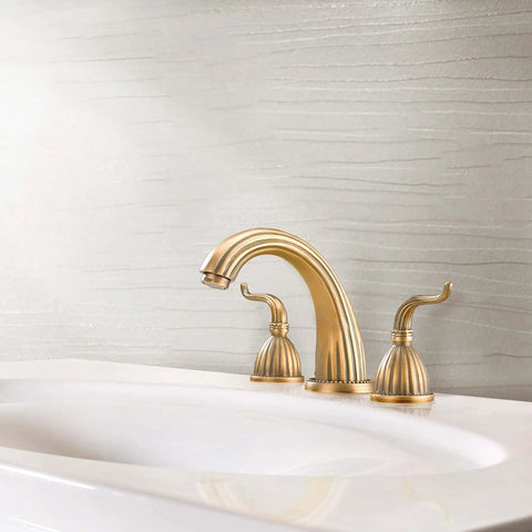 Antique Brass Two-Handle Three-Hole Bathroom Sink Faucet With Drip-Free Solid Brass Construction Hot And Cold Water Mixing Classic Vanity Tap Matching Metal Pop-Up Drain Assembly For Easy Install on white sink