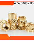 M1.4 size hot melt brass insert nuts with secure knurled threads, ideal for DIY projects and small parts assembly.
