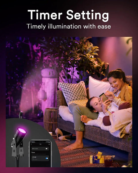 56Ft Smart Landscape Lights Waterproof 6 Pack Low Voltage RGBAIWW Color Changing Spotlight Outdoor Lights For Christmas Decorations With WiFi App Voice Remote Control Alexa Compatible, showing a cozy outdoor scene with light in use.