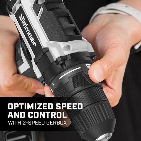Hands holding Beast Of A 20V Max Cordless Drill Set With Lithium Battery and Charger, showing 3/8 inch keyless chuck and dual speed control.