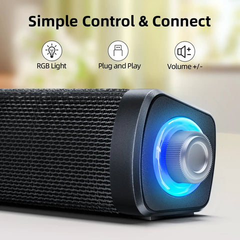 Close-up of USB Computer Speakers With 3.5mm Aux, Wired USB Powered Sound Bar With Colorful LED Lights and volume knob