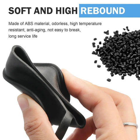 Hand holding Tesla EV Charger Port Cover Waterproof Soft Silicone Dust Cap, black, soft texture, next to black granules.