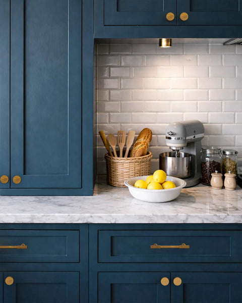 Top Shelf Antique Brass Cabinet Knobs And Drawer Pulls 10 Pack Heavy Duty Solid Metal Handles rust proof on blue kitchen cabinets.