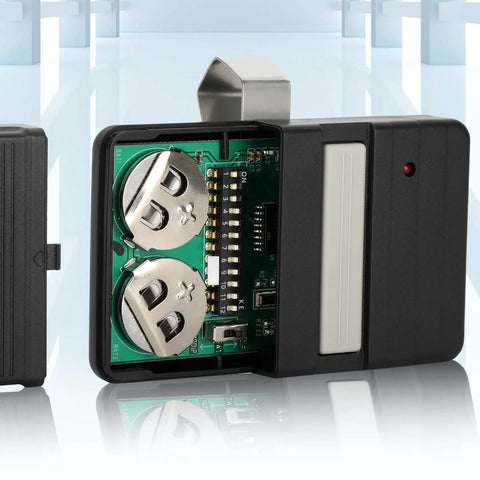 Garage Door Remote Control 390MHz Replacement For 9 To 12 Dip Switch Openers, circuit board and batteries visible