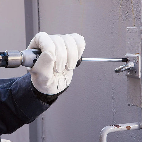 Dual Function Impact Driver And Screwdriver In One No 2 Cross Point Tip for JIS And Phillips in use on metal surface.