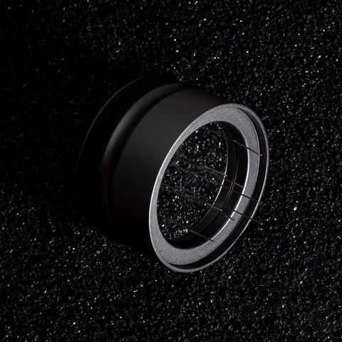 Top Shelf 58mm Stainless Steel Coffee Powder Leveler And Needle Distributor Tool showcasing sharp wire nodes on a sleek surface.