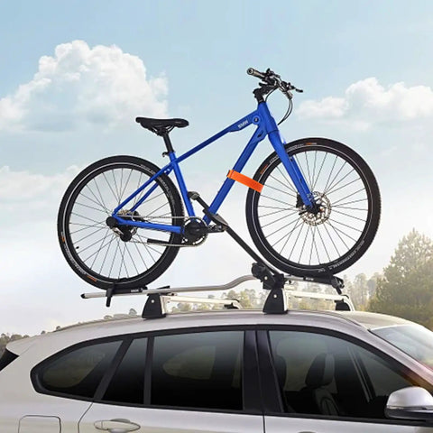 Blue bike secured on car roof with 6 Pack Bike Rack Straps 60x2 Cm Adjustable Wheel Stabilizers, nylon polyester, non-slip gel.