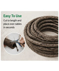 Straight Up Realistic Artificial Tree Bark Cable Cover With Hollow Flexible Vine Conduit Tube shown in a roll, easy to cut for garden wire concealment.
