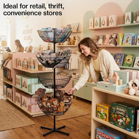 Heavy Duty Four Tier Wire Floor Spinner Rack With Drop Bin And Stocking Cart For Top Shelf Retail Shops Or No Fuss Home Organization In Sleek Black Finish showcasing baskets filled with toys in a store.