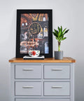 Decorated dresser with framed artwork and plant on top, featuring square 5 inch brushed nickel cabinet pulls for kitchens durable stainless steel hardware set of 60 with drill mounting template and easy install for quick upgrades on cabinets.