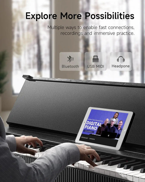 Person playing OURA S300 88 Key Weighted Digital Piano With Graded Hammer Action, Bluetooth Connectivity, tablet on music stand.