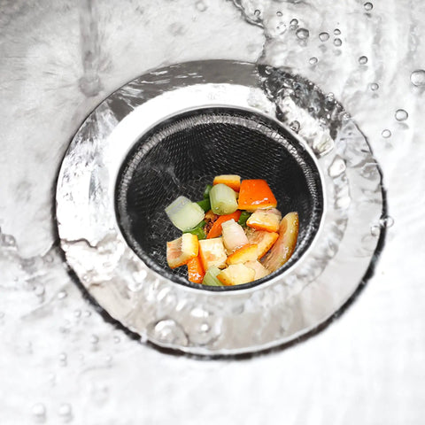 Heavy-Duty Kitchen Sink Strainer Set, 2 Dope Stainless Steel Mesh Drain Screens With Wide Rim in use with food debris