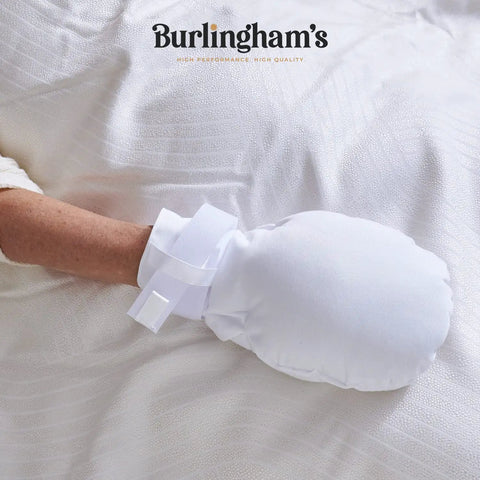 Double Security Mitts For Hand Restraint In Healthcare on hand, white mitt with strap, extra padding for comfort, no slip fit