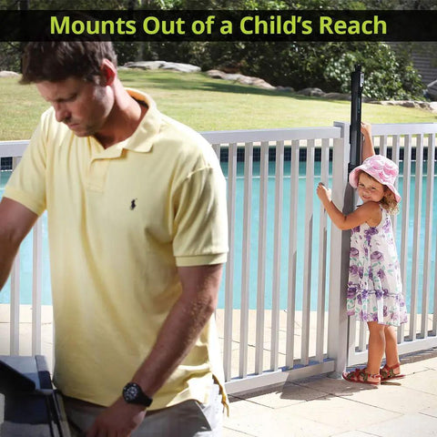 Man and child near a pool with MagnaLatch Top Pull 20 Inch Gate Latch Magnetic Lock System For Pool Safety And Kid Safe Gates visible