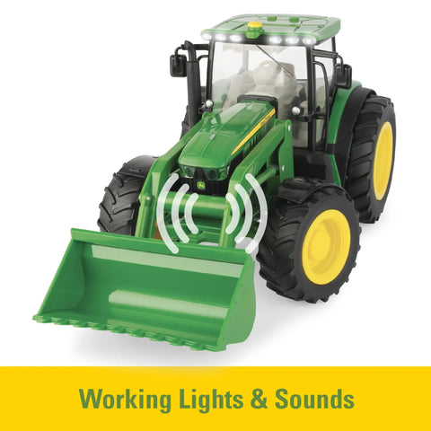 Front view of 1/16 Scale Big Farm 6210R Tractor With Loader And Spreader Toy Set showing working lights and loader