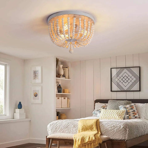 Wood Beaded Chandelier 3 Light Semi Flush Mount Boho Farmhouse Ceiling Light In Oak White Finish in cozy bedroom setting.