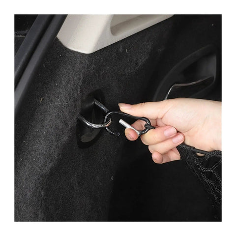 Hand securing hook on Three Pocket Trunk Cargo Net Made For Tesla Cybertruck 2024 Plus black mesh storage organizer.