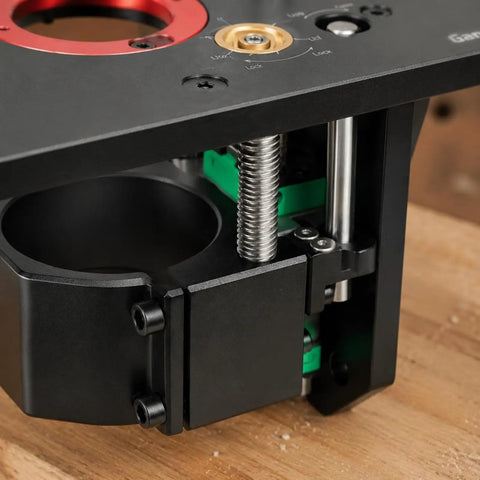 Close-up of Rock Solid Router Table Insert Lift Plate, showcasing heavy-duty aluminum and dial height control mechanism.
