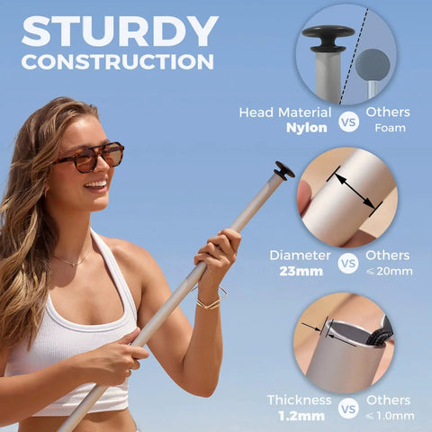 Woman holding a pole showing sturdy construction for No Fuss Setup Beach Tent Sun Shelter With Four Poles Big Sandbags And Shovel