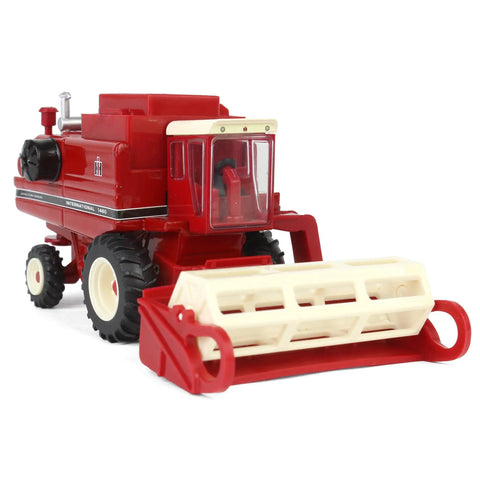 Front view of International Harvester 1460 Combine Die Cast Model One Sixty Fourth Scale With Rear Wheel Assist And Interchangeable Four Row Corn Head And Grain Head For Collectors Authentic Die Cast Metal Replica showcasing corn head attachment.