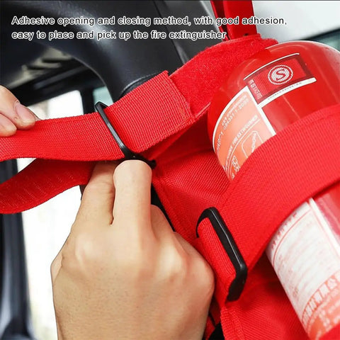 Close-up of Rig Ready Adjustable Fire Extinguisher Holder Roll Bar Strap Bracket securing a red fire extinguisher, 14.6x6.7 inches.