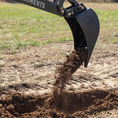 Beefed Up 10 Inch Front And Backhoe Bucket With Replaceable Carbon Steel Teeth And Hydraulic Tilt For Excavators Skid Steers And Loaders Ideal For Heavy Duty Digging And Yard Work, shown digging soil