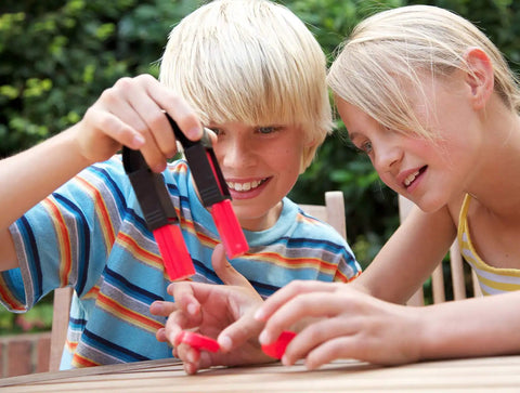 Children experimenting with Magnet Science Kit for Kids With 10 Hands On Magnetic Experiments And Games And 25 Plus Pieces