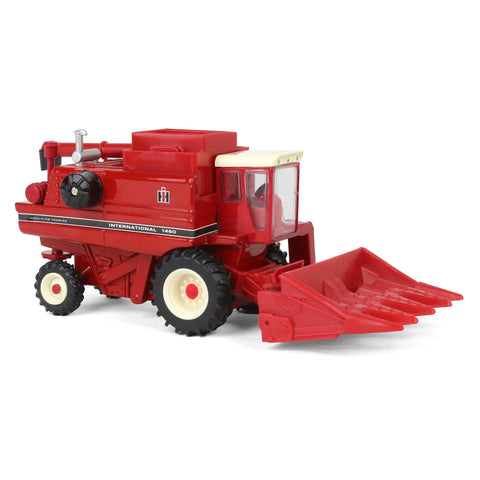 Side view of International Harvester 1460 Combine Die Cast Model One Sixty Fourth Scale with corn head attachment.