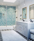 Ladera 8 Inch Widespread Two Handle Bathroom Faucet In Tuscan Bronze installed on modern vanity in elegant bathroom.