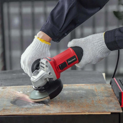 Premium Heavy Duty 4 1/2 Inch Angle Grinder With A Badass 7.5 Amp Motor cutting through metal surface with precision.