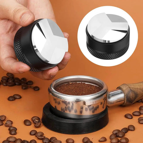Portable Espresso Tamper Kit For 51Mm Filter Cups, showing a hand holding a metal tamper over a portafilter with ground coffee.