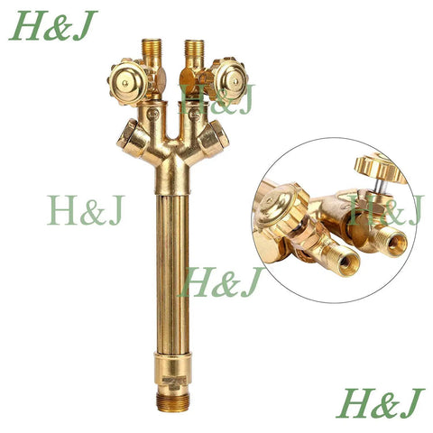 Beefy Heavy Duty Acetylene And Oxygen Cutting Welding Torch Kit With Handle And Cutting Attachment Three Piece Set Durable Brass And Stainless Steel Victor Type Ready For Multiple Gas Options Cutting Nozzle Tip Included, close-up of brass handle with valve details
