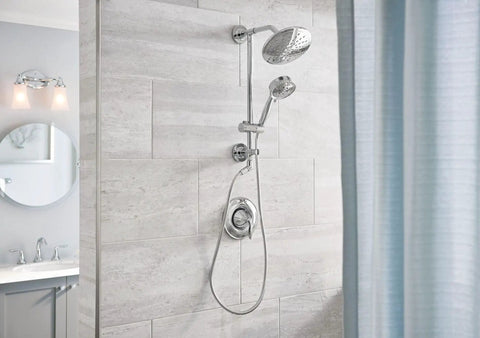 Chrome Replacement Handheld Showerhead With Four Function Eco Performance WaterSense Certified installed in modern bathroom.